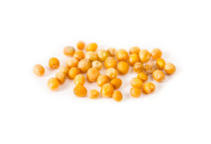 Macro Closeup Of Organic Yellow Mustard Seeds.